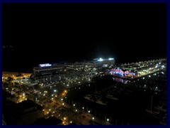 Alicante by night 54 - view from the 27th floor of our hotel Tryp Gran Sol towards the marina and Melia Hotel