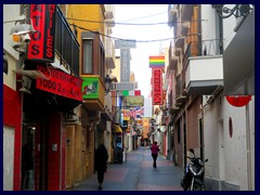 Old Town Benidorm -  a mix of restaurants, cheap cloth stores, sex shops, bar, nightclubs...