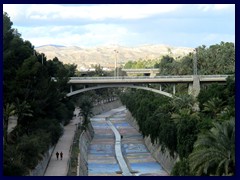 Elche City Centre 35 - Carrer Reina Victoria seen from Carrer Porta Oriola, both bridges above the small Vinalupo River.