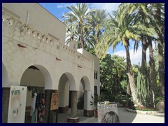 Huerto del Cura 02 - the House and the Chapel, built in 1940 in local style. The wide porch is supported by pillars from palm trees!