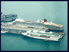 Huge luxury cruising ships in Victoria Harbour, Kowloon, seen from Sky 100.