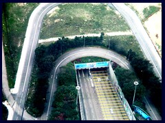 Sky100 views: A highway tunnel under Victoria Harbour, towards, HK Island.