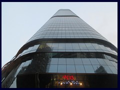 Langham Place, a 255m tall skyscraper above the  shopping mall. It has 59 floors and was the tallest office building on the Kowloon peninsula until 2010. 