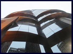 Langham Place, a 255m tall skyscraper above the  shopping mall. It has 59 floors and was the tallest office building on the Kowloon peninsula until 2010. 