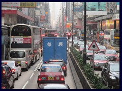 Nathan Road seen from a double decker bus.