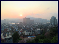 Macau sunset skyline with Zhuhai, China in the background. Zhuhai is situated across the Chinese border and has about 1.5 million inhabitants, twice as much as Macau.