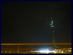 Macau Tower at night from the bridge to Taipa. At 338m it is the tallest tower in Macau.