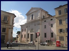 Via di San Giovanni in Laterano, the hilly and narrow street to the right, leads down through an hill from the piazza to Colosseum. The street has an Italian small town feeling.