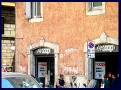 Coop store in a historic building, Largo di Torre Argentina.