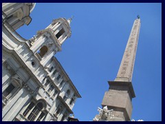 Piazza Navona with the fountain's obelisk and the church.