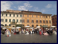 There are many artists at Piazza Navona. It is hard to believe that this picture was taken just after a heavy rain/thunderstorm.