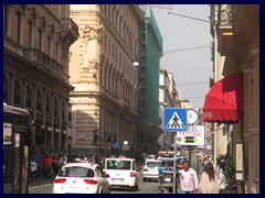 Via del Tritone is a busy road that goes between Piazza Barberini and Piazza di Monte Citorio, in an East-West direction. At Piazza Barberini it changes name to Via Veneto.