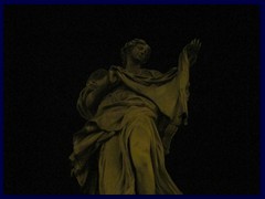 Sculpture of Ponte Sant 'Angelo by night.