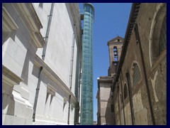 This modern glass elevator leads to the higher observation deck of the Monument to Vittorio Emanuele II.