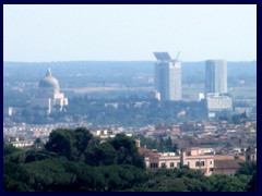 Views  from St Peter's Basilica, Vatican EUr district with :Rome's 2 tallest and only skyscrapers so far:  Torre Eurosky (155m) and Torre Europarco (120m). The modern dome church to the left is called asilica dei Santi Pietro e Paolo all' EUR.