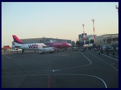 Waiting for our flight at Vilnius Airport. You have to walk outside to approach the flight.