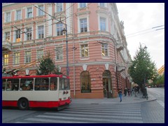 Gedimino Avenue. Typical old fashioned trolley bus from the Soviet times passes Mark & Spencers.