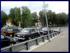 Vintage Russian wedding cars at Mindaugo bridge.