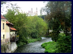 The Vilnia River borders to Uzupis from the Bernardine Garden in the Old Town.