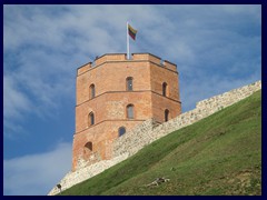 Gediminas Tower, here seen from Bernardine Garden, is the remaining part of the Upper Castle. from 1409. It is mentioned in many patriotic poems and is a symbol of Vilnius. It can be climbed to the top, after the hill it is situated on have been reached by funicular, or steep stone walkways. There is a history exhibition inside.